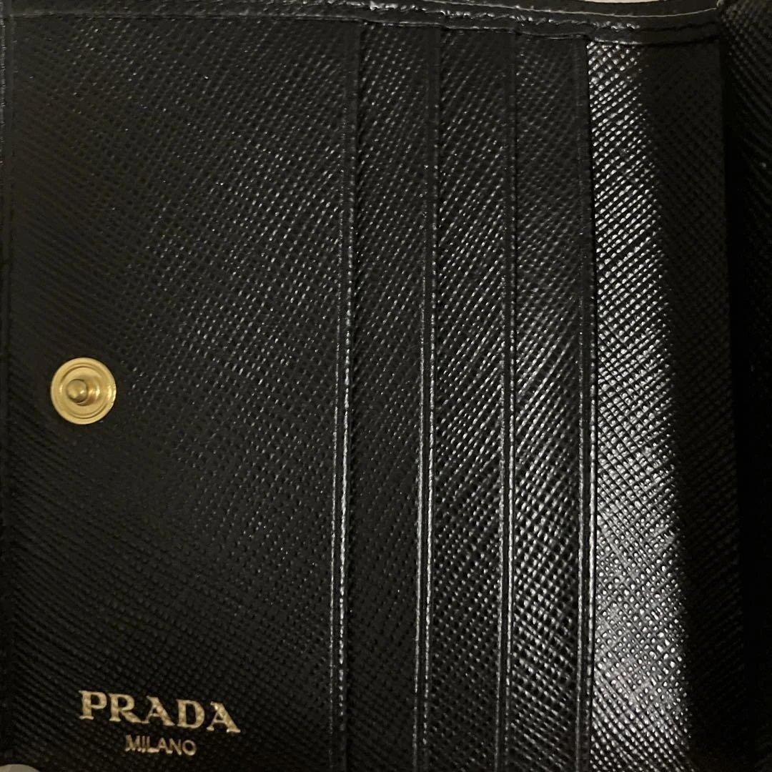 未使用に近い PRADA プラダ 二つ折り財布 サフィアーノレザー