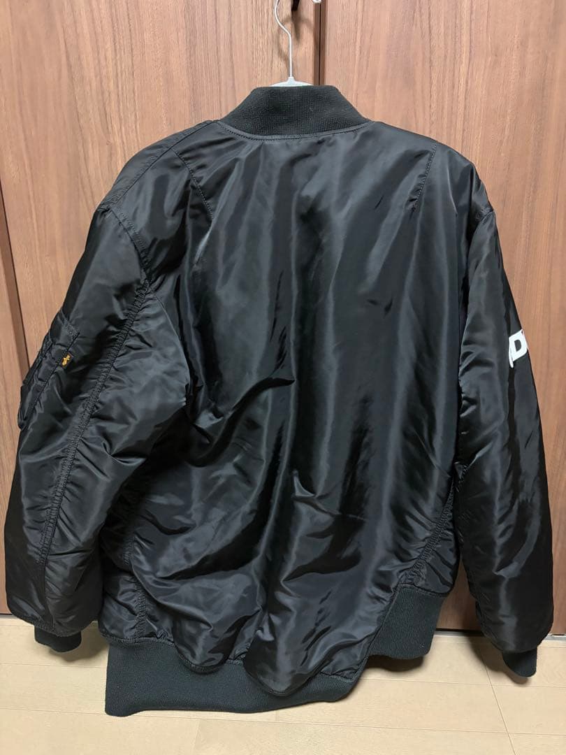 ジャケット・アウター CDG x ALPHA INDUSTRIES BIAS DESINED MA1