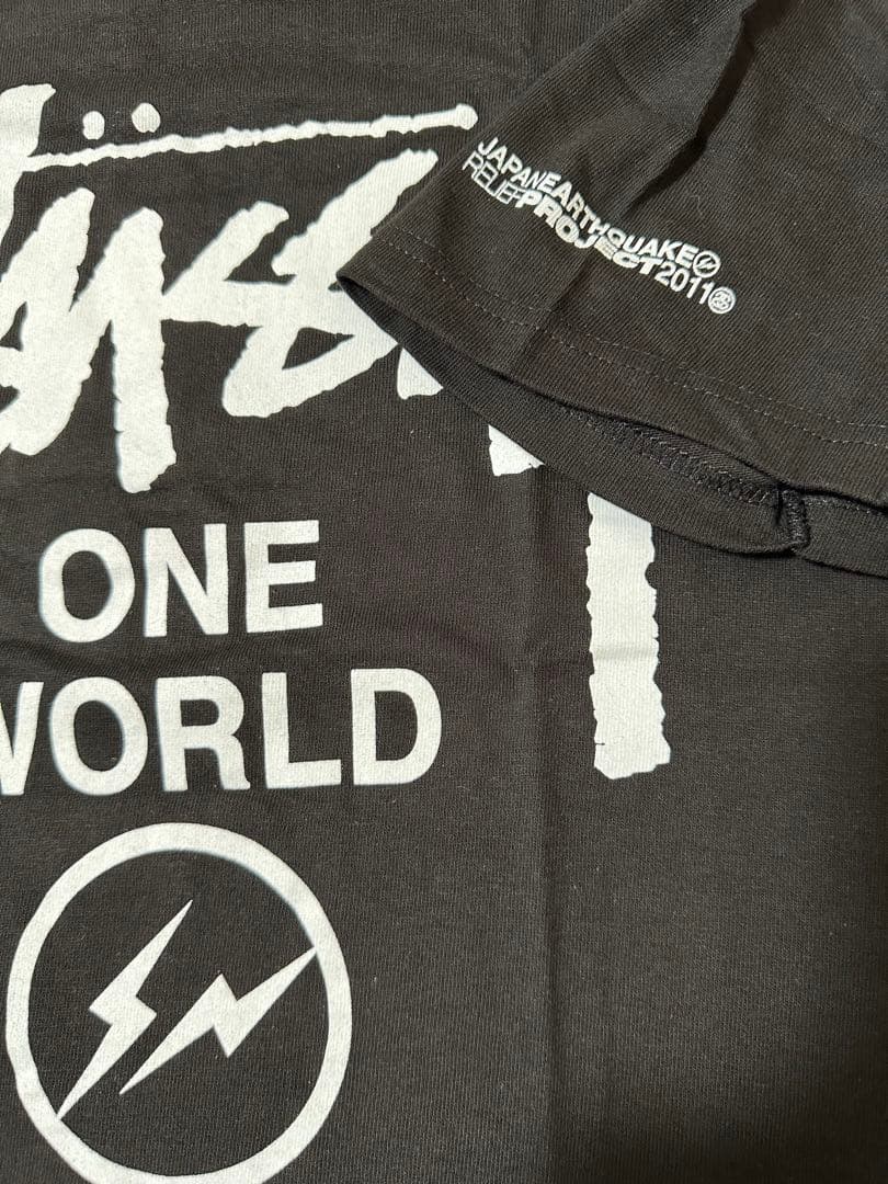 新品未使用Stüssy ブラック フラグメントチャリティTシャツ　M