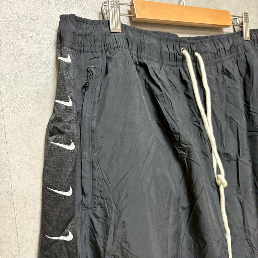 NIKE XL スウッシュ総柄 ナイロンパンツ ブラック　XL