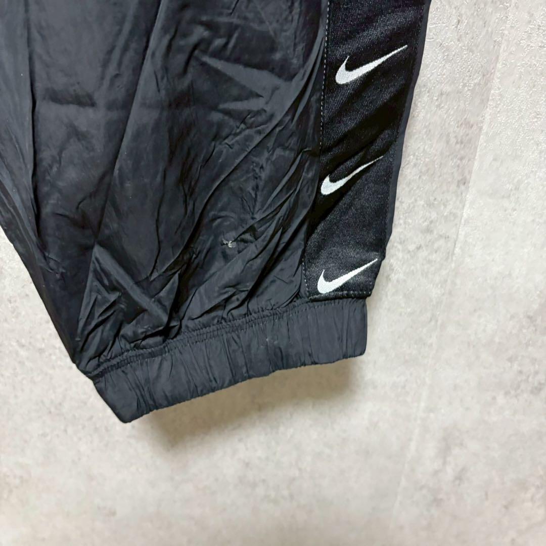 NIKE XL スウッシュ総柄 ナイロンパンツ ブラック　XL