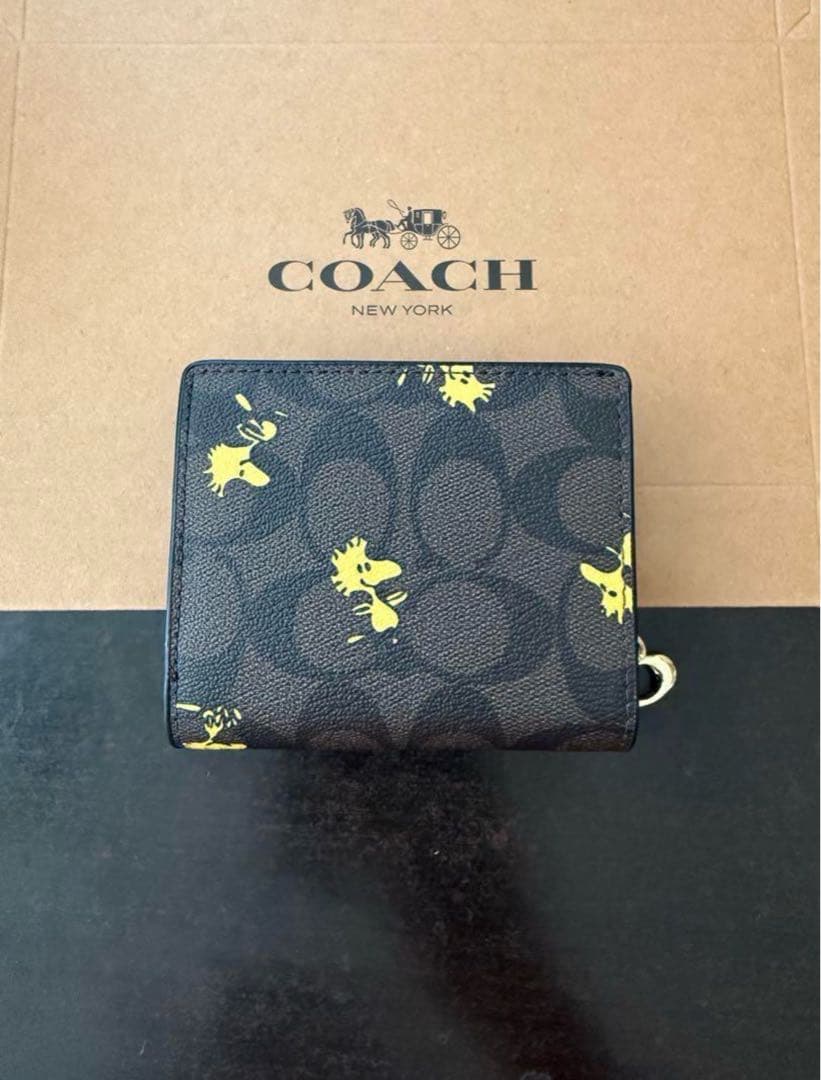 COACH 二つ折り財布 ブラック イエローキャラクター