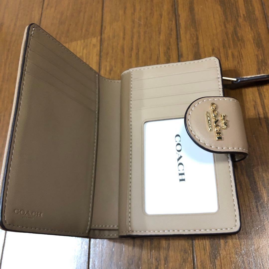COACH ベージュ 二つ折り財布