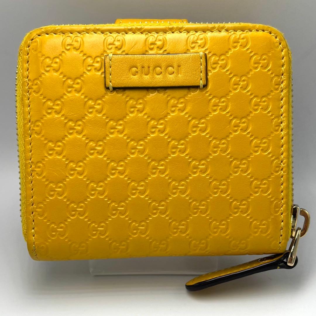 【美品】GUCCI グッチ 二つ折り財布 シグネチャー イエローレザーレディース