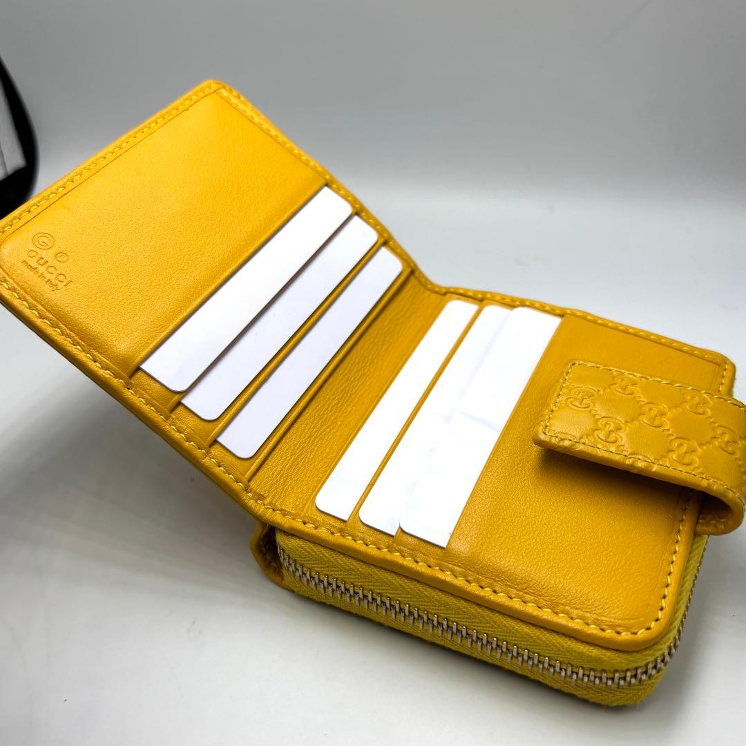 【美品】GUCCI グッチ 二つ折り財布 シグネチャー イエローレザーレディース