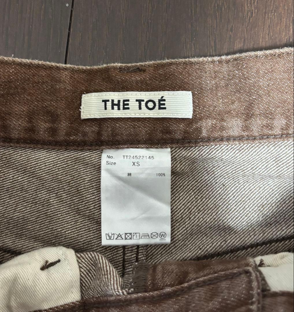 THE TOÉ EMIRATES TRACK DENIM PANTS