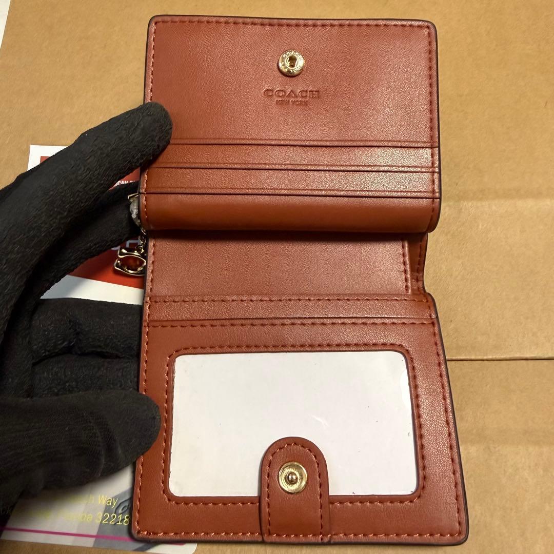 新品✨ COACH 猫プリント 二つ折り財布 シグネチャー ブラウン PVC