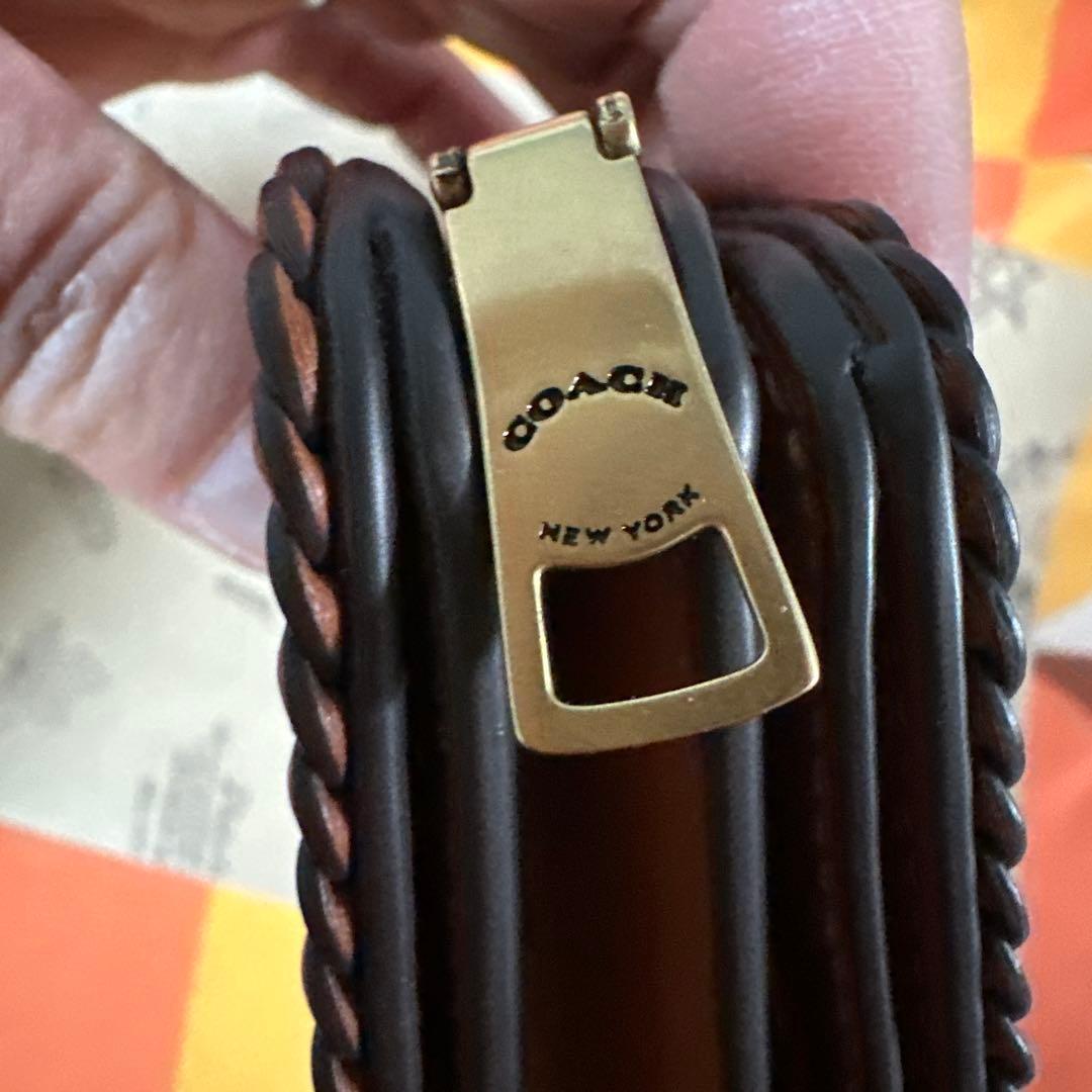COACH ブラウン 二つ折り財布 編み込みデザイン