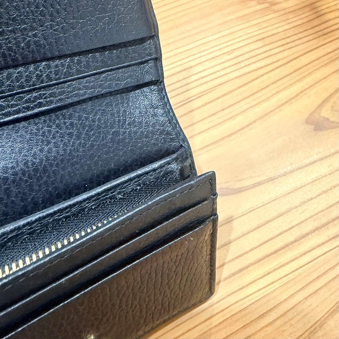 Gucci 黒 レザー 二つ折り財布