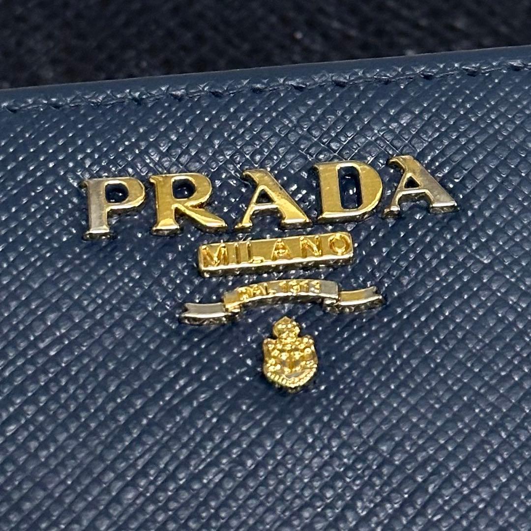 PRADA 折り財布　ゴールドロゴ　ブルー　ラウンドジップ　サフィアーノレザー