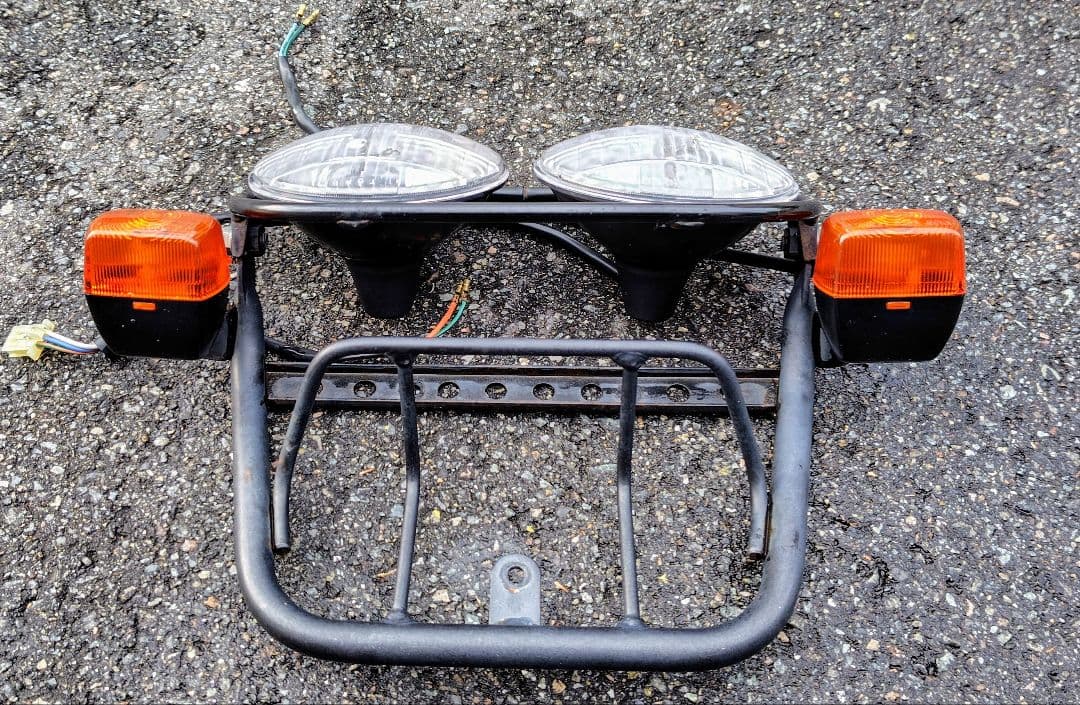 ホンダ HONDA ズーマー純正ヘッドライト ステーウインカー【中古・お買得品】