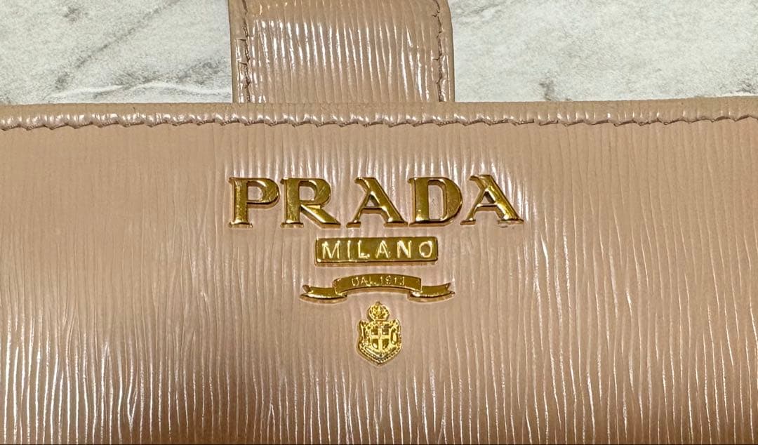 PRADA プラダ 2つ折り財布 ピンクベージュ サフィアーノ レザー ベージュ