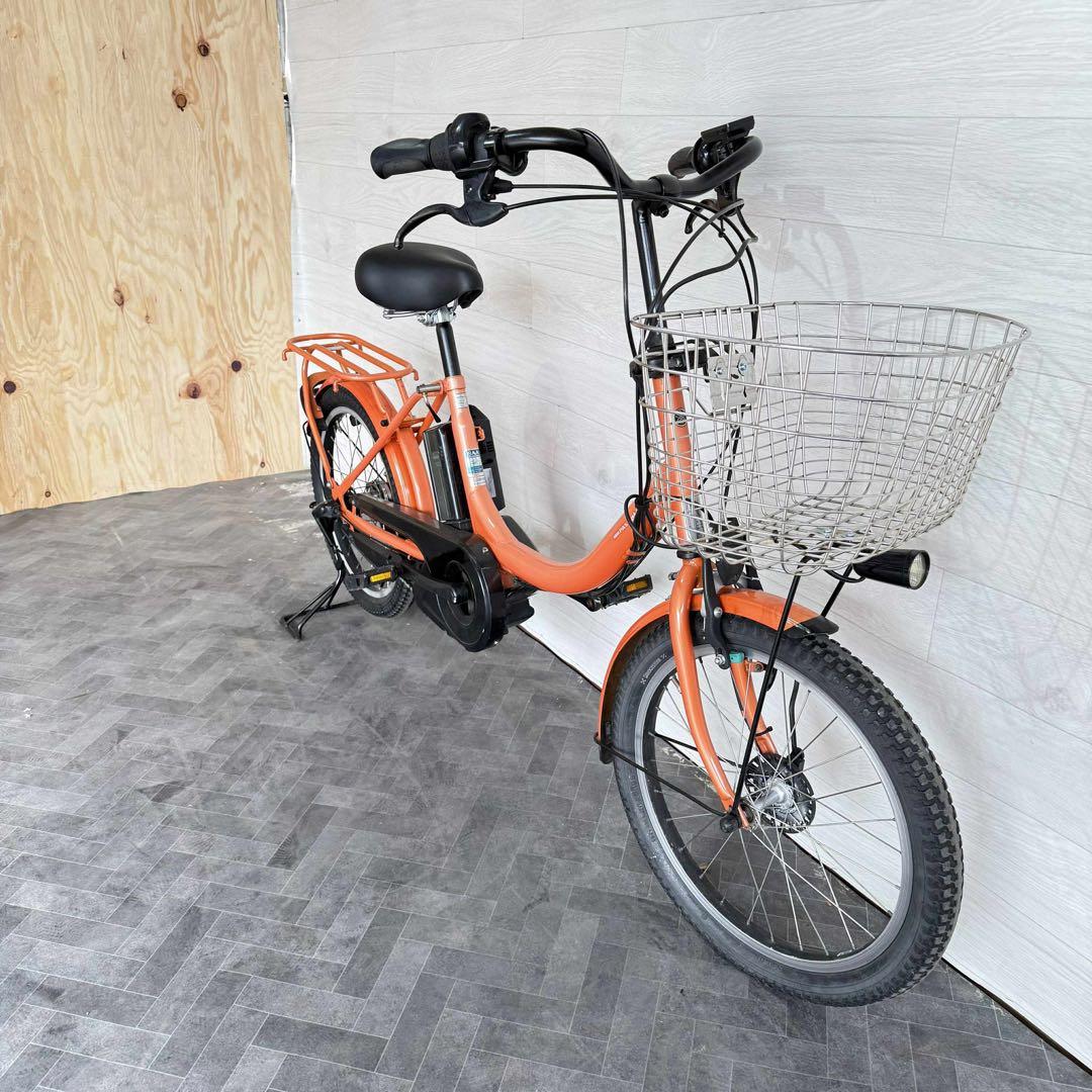 オレンジ 電動アシスト自転車 シティタイプ