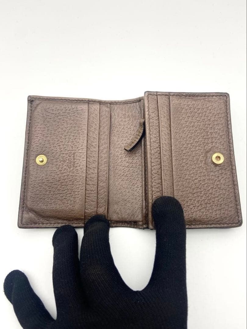 ゲ*！様 GUCCI 二つ折り財布 オフディア　シェリーライン
