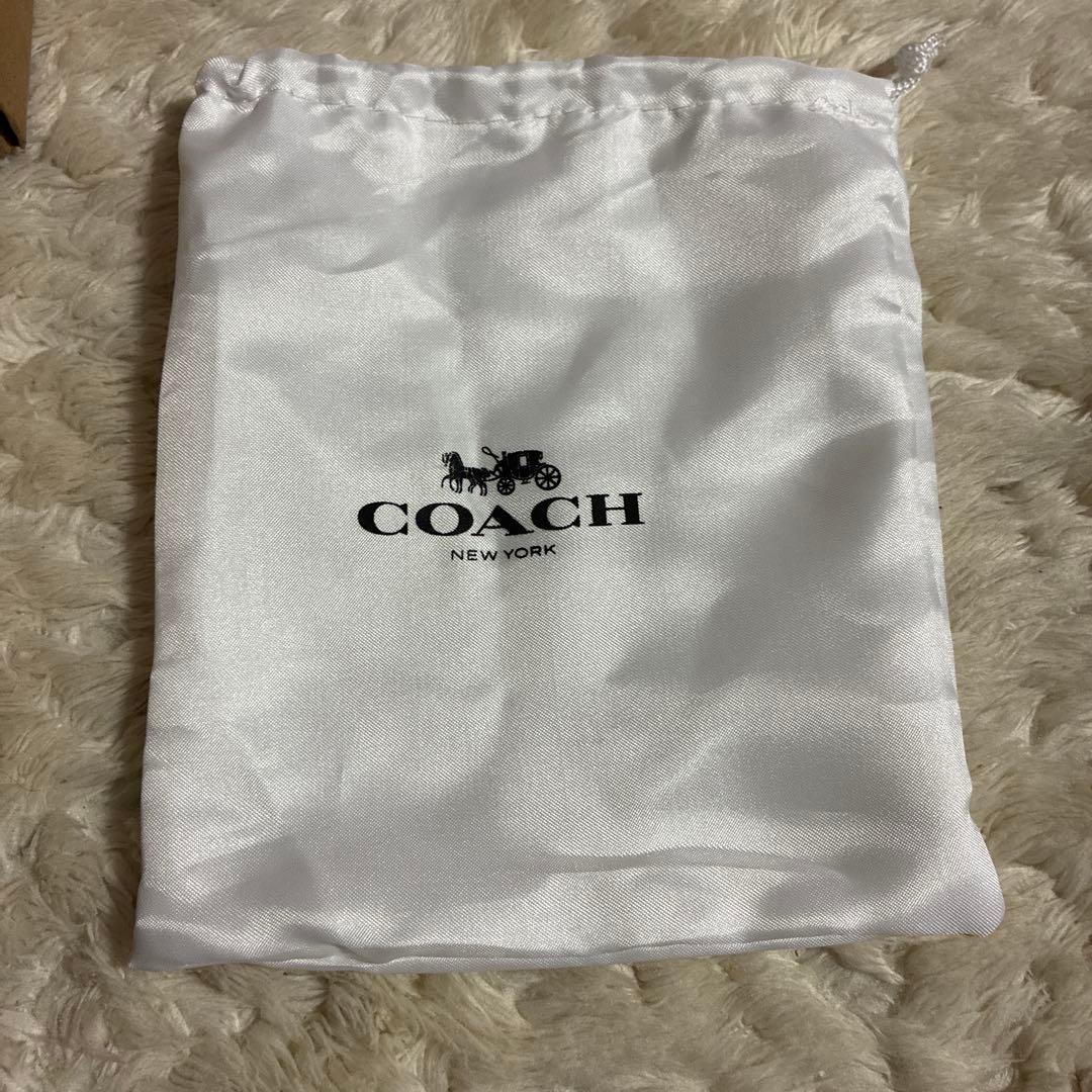COACH ピンク 二つ折り財布　折りたたみ財布　春財布