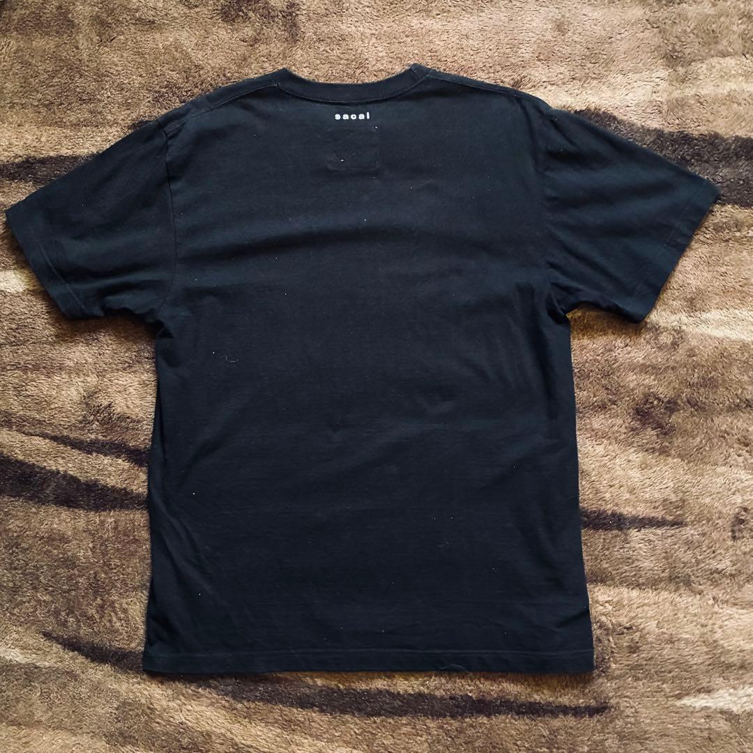 コラボ サカイ カウズ Tシャツ 半袖 コラボ センターロゴ