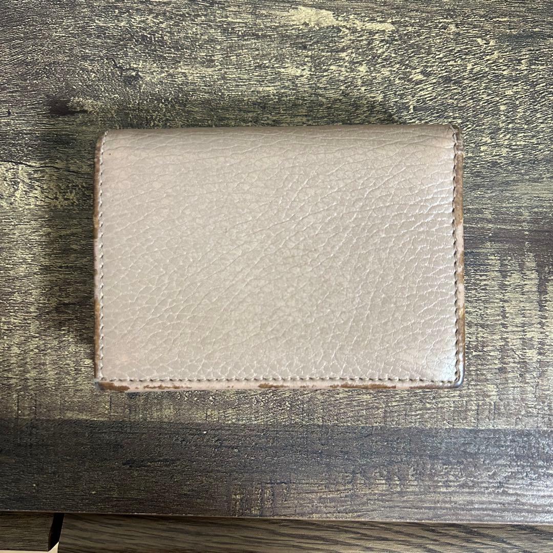GUCCI ベージュ 二つ折り財布 GGロゴ