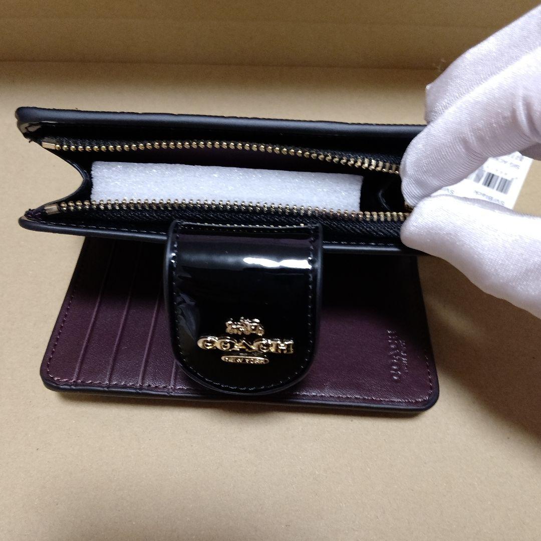 【オープン価格】COACH シグネチャーエンボス加工 二つ折り財布
