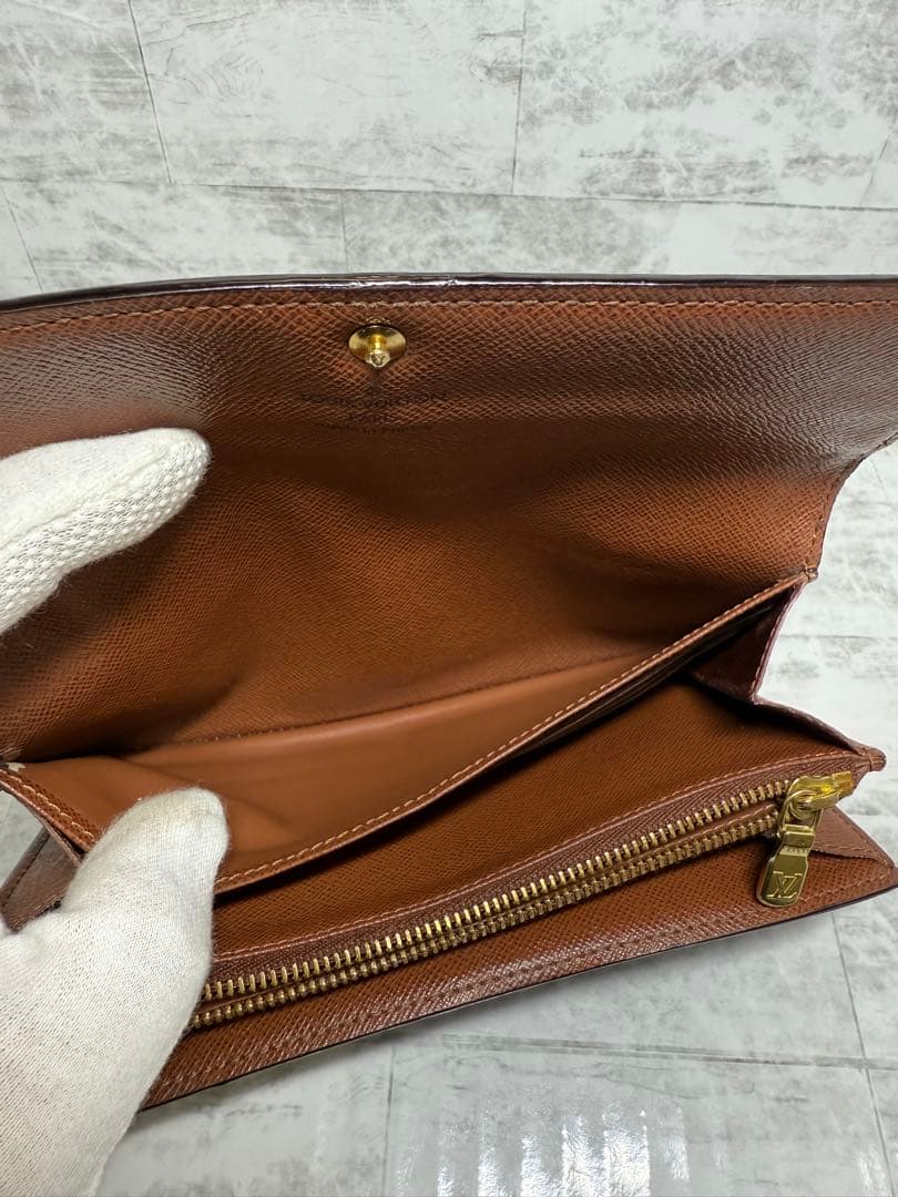 ルイ・ヴィトン 二つ折りフラップ長財布 モノグラム　中古