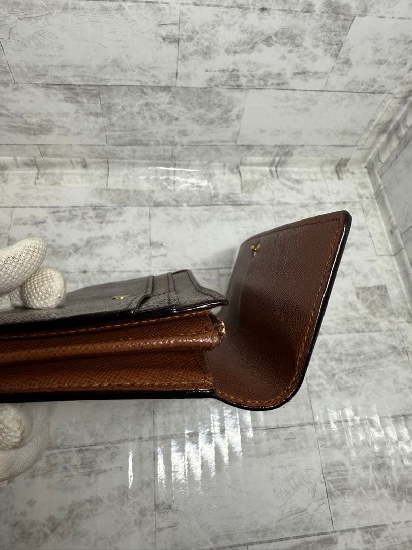 ルイ・ヴィトン 二つ折りフラップ長財布 モノグラム　中古