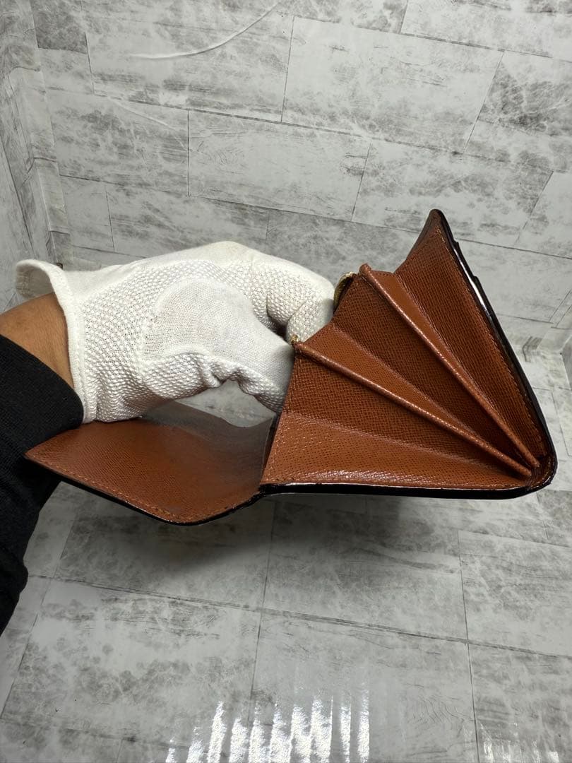 ルイ・ヴィトン 二つ折りフラップ長財布 モノグラム　中古