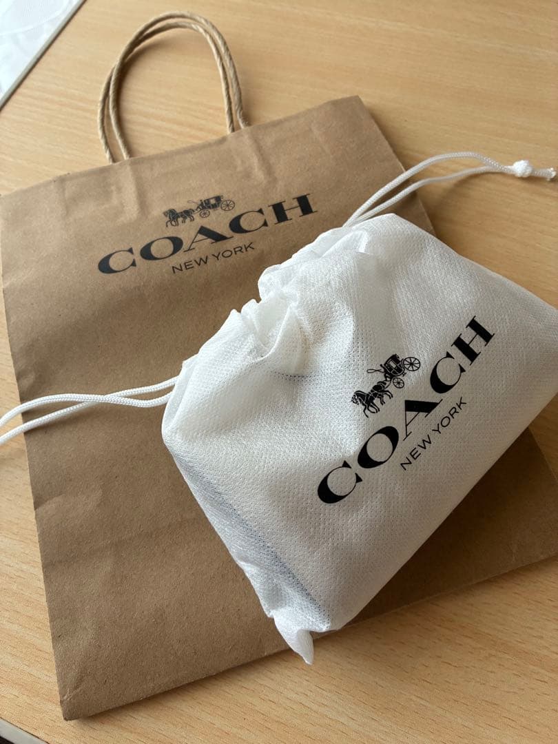 COACH アイボリー 二つ折り財布 保存袋付き