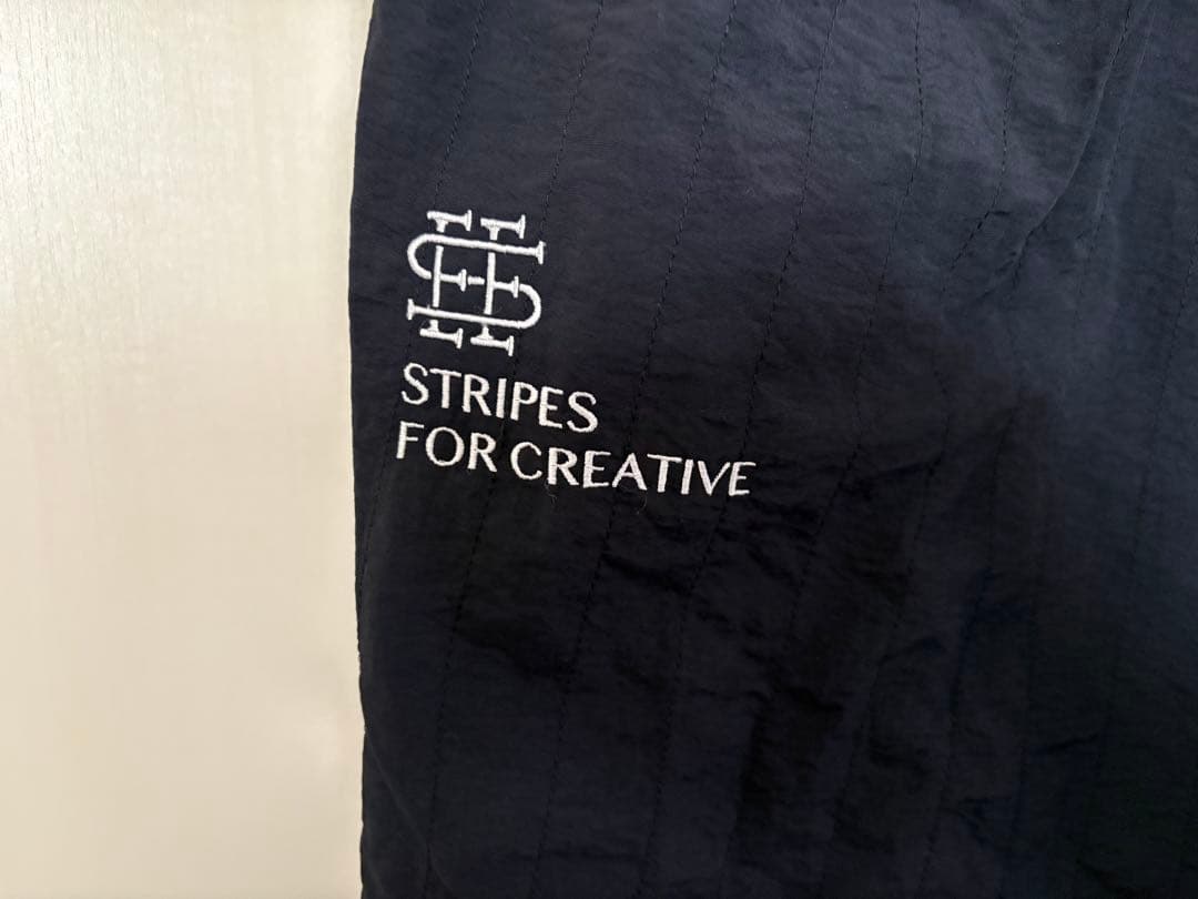 SEESEE × S.F.C WIDE TAPERED NYLON PANTS