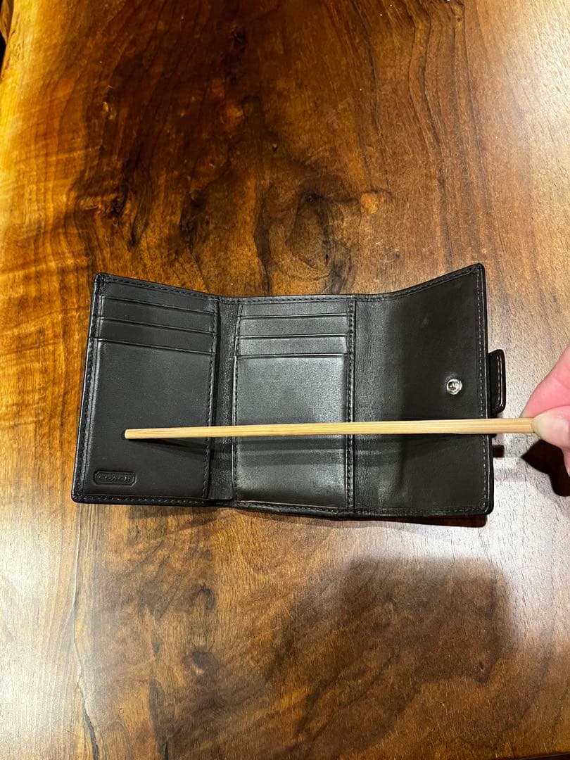 【正規品】コーチ　シグネチャーキャンバス×レザー ベルトモチーフ三つ折り財布