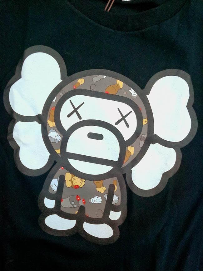 新品 ア ベイシング エイプ BAPE × KAWS カウズ マイロ TシャツL
