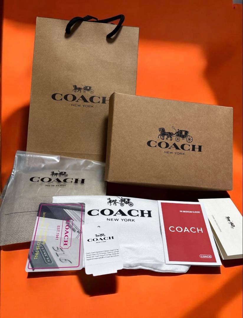 【新品】COACH ★折り財布ベージュ/ピンク《新品》