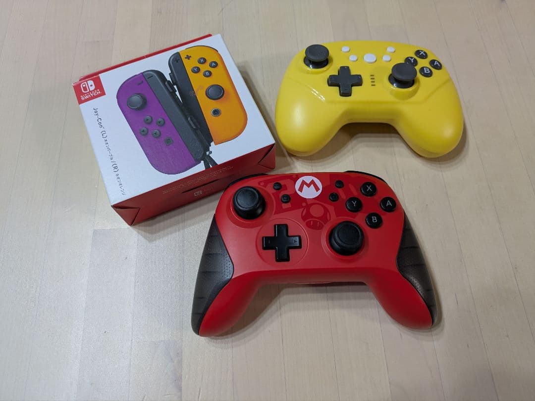 Nintendo Switch 本体 + ソフト４個、コントローラー４個