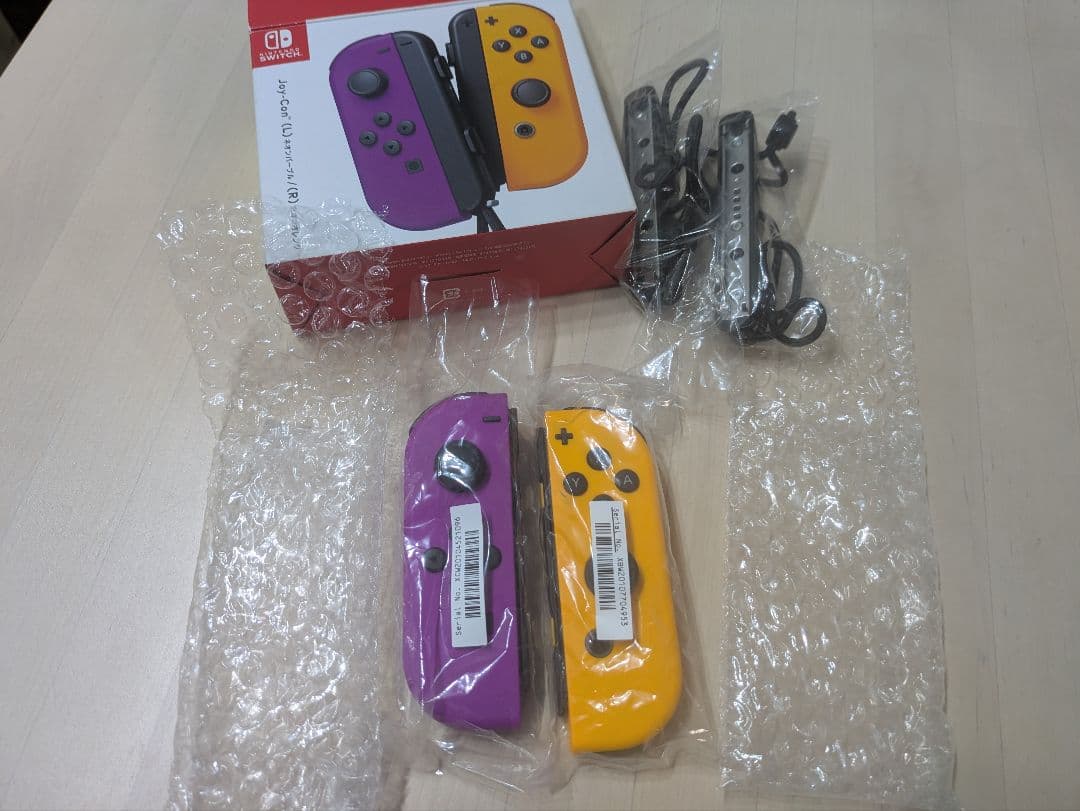 Nintendo Switch 本体 + ソフト４個、コントローラー４個