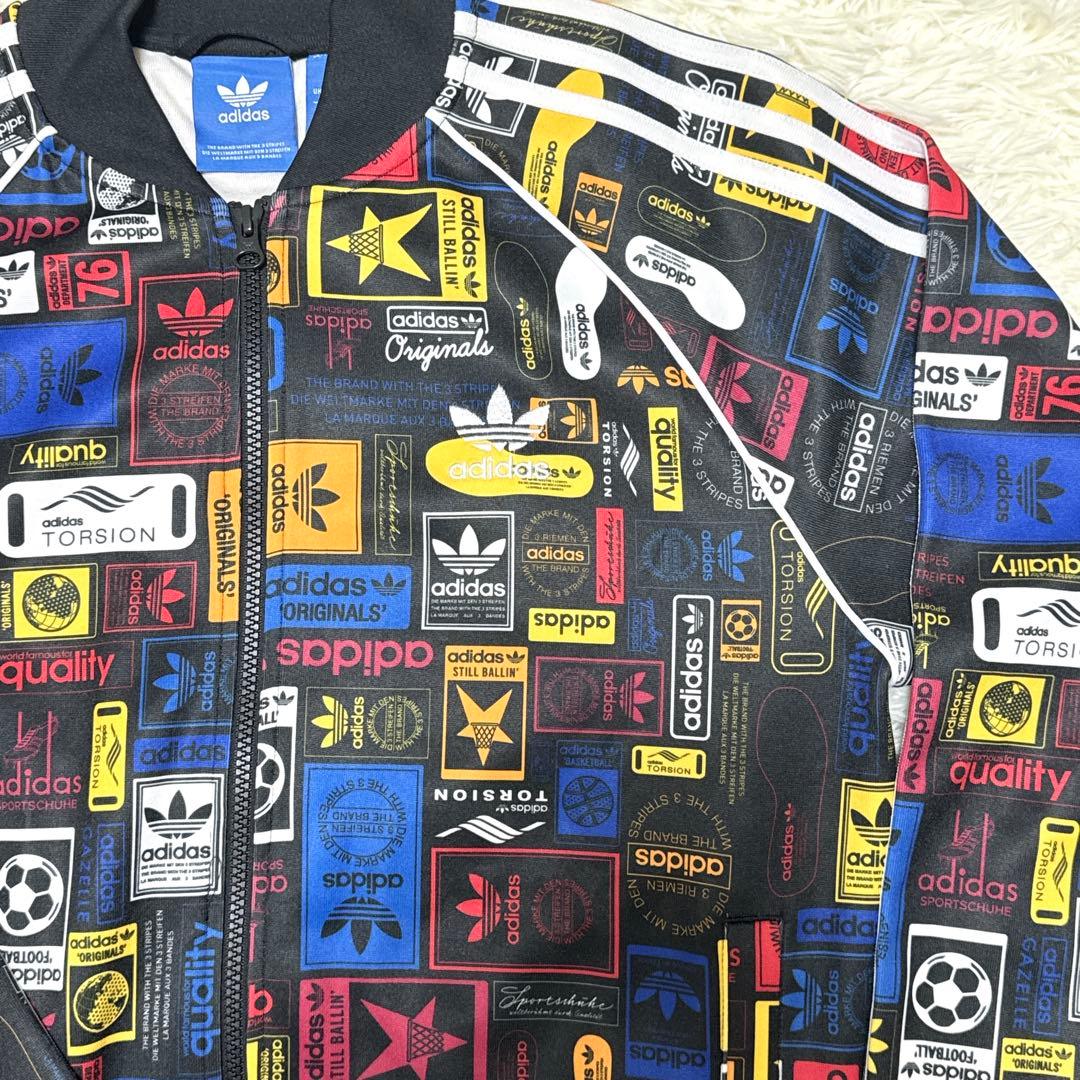 ゴージャス アディダス adidas(L)トラックジャケット 総柄 トレフォイル
