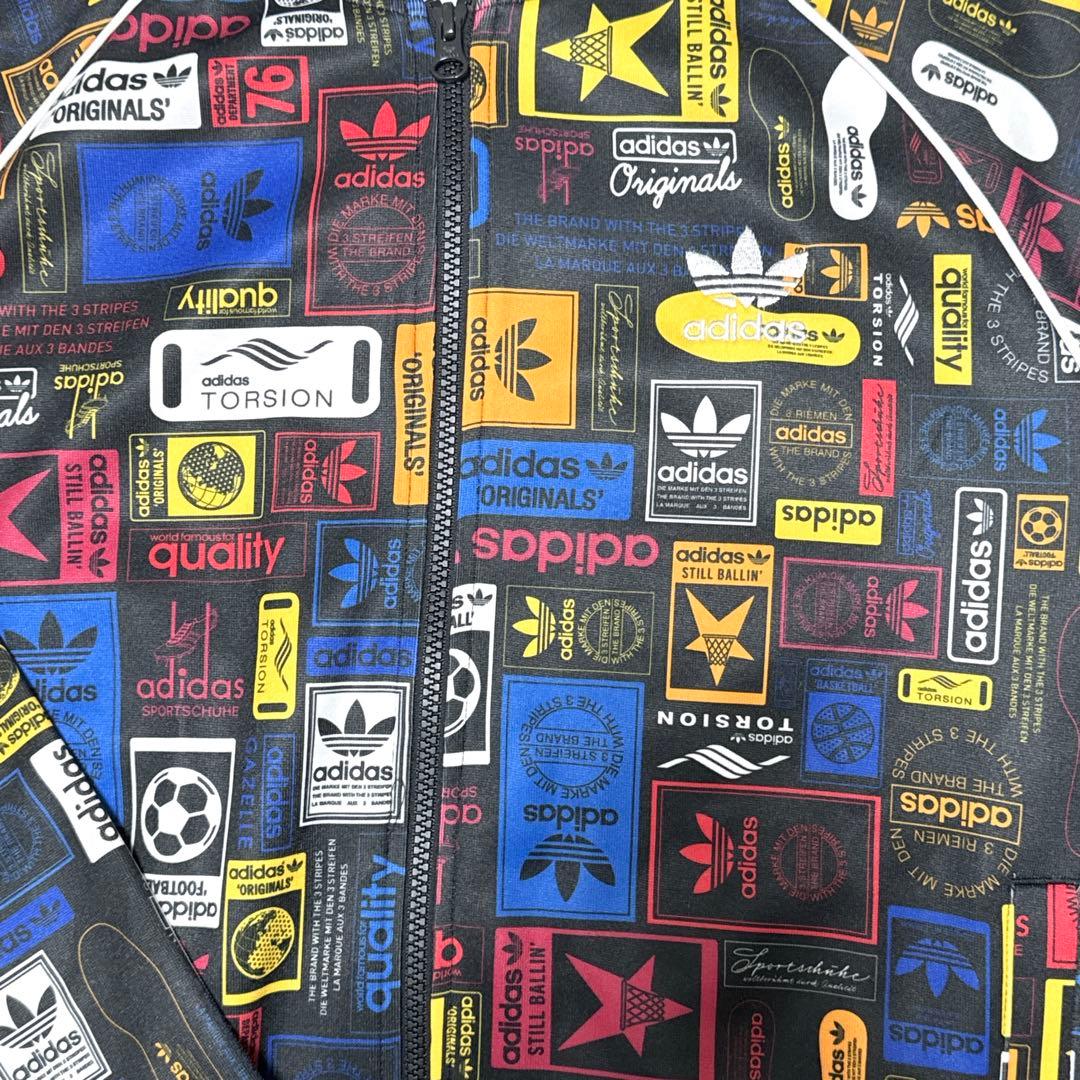 ゴージャス アディダス adidas(L)トラックジャケット 総柄 トレフォイル