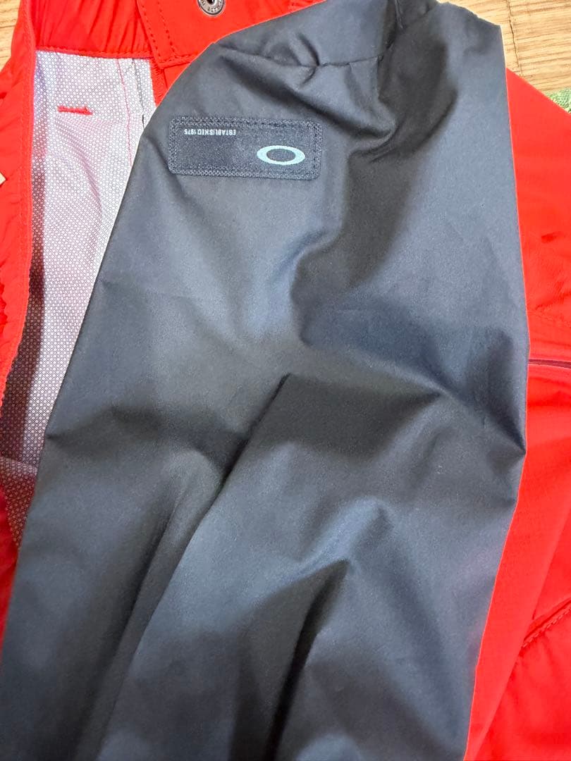 お*み様 新品正規品【OAKLEY/XLストレッチレインパンツ DERMIZAX