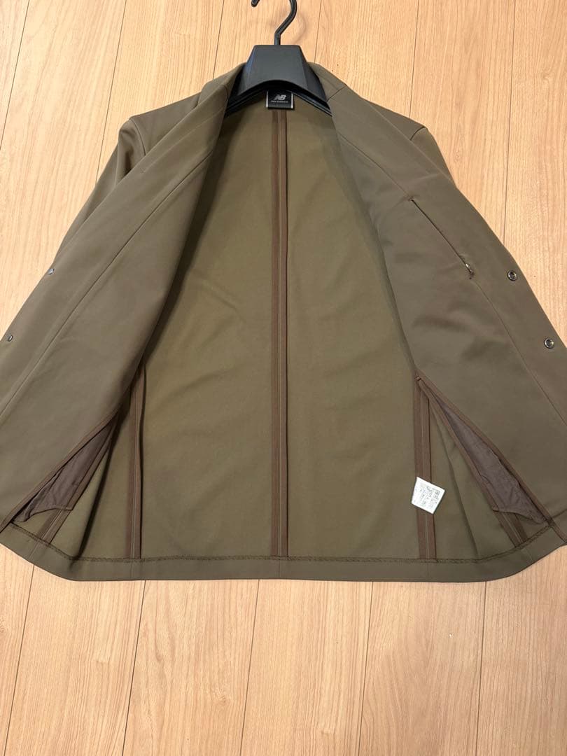 値下美品カーキセットアップNew Balance/MET24 スリムテーパー