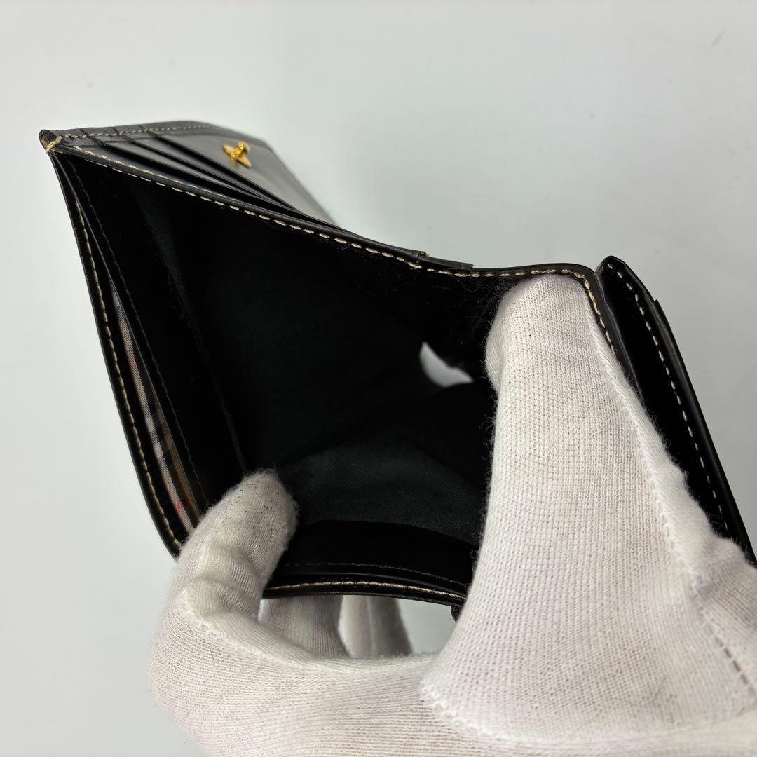 美品】バーバリー　二つ折り財布　ブラック　レザー　ゴールド金具　ノバチェック